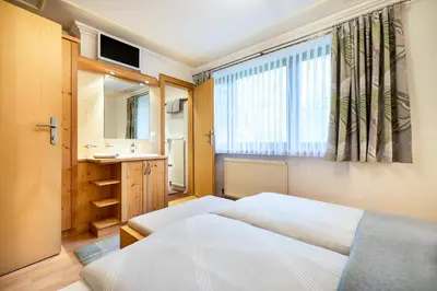 Ein Bett oder Betten in einem Zimmer der Unterkunft Haus Gumpold 2
