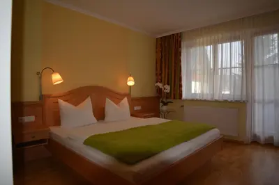 Ein Bett oder Betten in einem Zimmer der Unterkunft Peterwirt