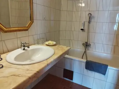 Ein Badezimmer in der Unterkunft Hotel Pension Kandolf