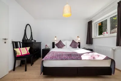 Ein Bett oder Betten in einem Zimmer der Unterkunft Berghaus Flachau