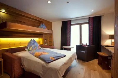 Ein Bett oder Betten in einem Zimmer der Unterkunft Sonnenseite Filzmoos