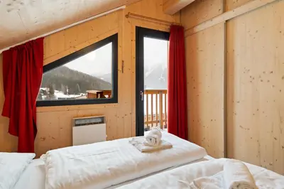 Ein Bett oder Betten in einem Zimmer der Unterkunft Chalet in Hohentauern - Chalet Ana