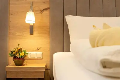 Ein Bett oder Betten in einem Zimmer der Unterkunft Appartement Krippenstein mit Indoorpool und Sauna