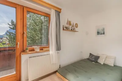 Ein Bett oder Betten in einem Zimmer der Unterkunft LOBE Apartment