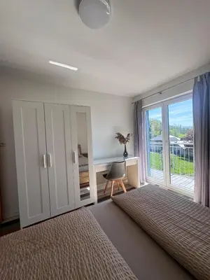 Ein Bett oder Betten in einem Zimmer der Unterkunft Ferienwohnung Lara
