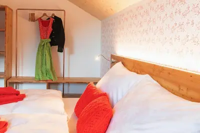 Ein Bett oder Betten in einem Zimmer der Unterkunft Feldhasen