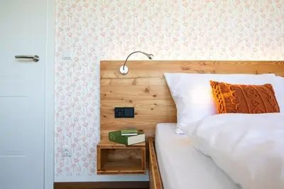 Ein Bett oder Betten in einem Zimmer der Unterkunft Feldhasen