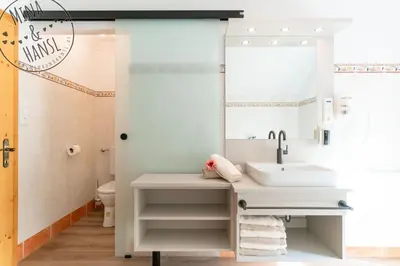 Ein Bett oder Betten in einem Zimmer der Unterkunft Mina&Hansl