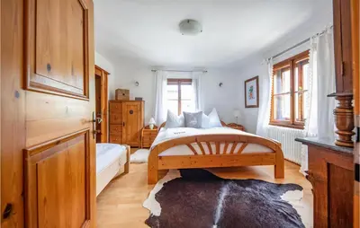 Ein Bett oder Betten in einem Zimmer der Unterkunft Gemuetliche Ferienwohnung Werf
