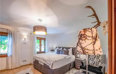 Ein Bett oder Betten in einem Zimmer der Unterkunft Gemuetliche Ferienwohnung Werf