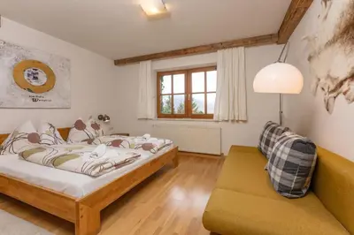 Ein Bett oder Betten in einem Zimmer der Unterkunft Hauskitz
