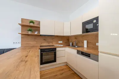 Küche/Küchenzeile in der Unterkunft Mountain Apartments - by myNests
