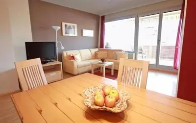 Ein Sitzbereich in der Unterkunft Apart 13 by Alpenidyll Apartments