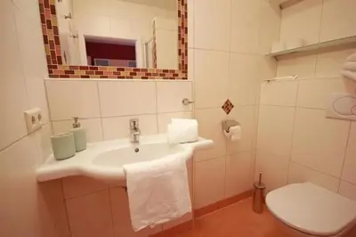 Ein Badezimmer in der Unterkunft Apart 13 by Alpenidyll Apartments