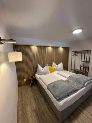 Ein Bett oder Betten in einem Zimmer der Unterkunft DAS MANFRED