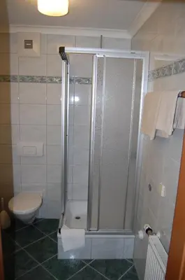 Ein Badezimmer in der Unterkunft Gasthof Grabenwirt