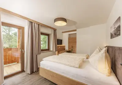 Ein Bett oder Betten in einem Zimmer der Unterkunft Unser Hoamat Appartement