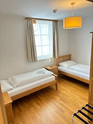 Ein Bett oder Betten in einem Zimmer der Unterkunft Steinadler Schaidberg FL - Skiing Holiday in Obertauern