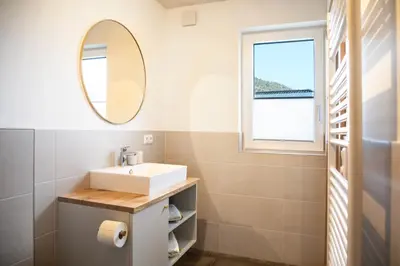 Ein Badezimmer in der Unterkunft Moosaik Appartements