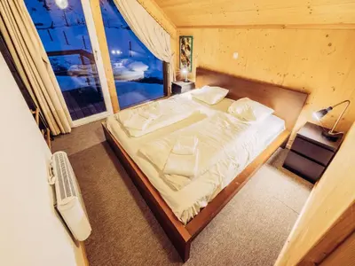 Ein Bett oder Betten in einem Zimmer der Unterkunft Kreischberg W14