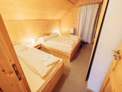 Ein Bett oder Betten in einem Zimmer der Unterkunft Kreischberg W10