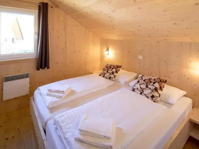 Ein Bett oder Betten in einem Zimmer der Unterkunft Murau 18
