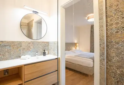 Ein Bett oder Betten in einem Zimmer der Unterkunft Refugium Bad Ischl