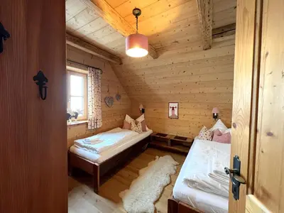 Ein Bett oder Betten in einem Zimmer der Unterkunft Holiday Home st martin chalets-1 by Interhome