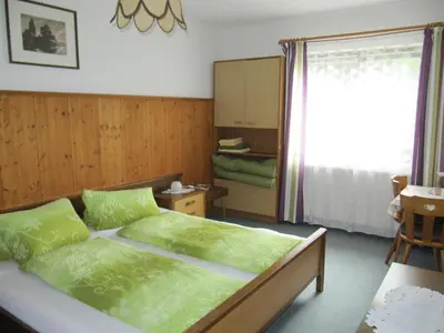 Ein Bett oder Betten in einem Zimmer der Unterkunft Ferienwohnung Wörndl
