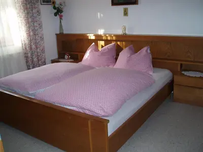 Ein Bett oder Betten in einem Zimmer der Unterkunft Ferienwohnung Wörndl