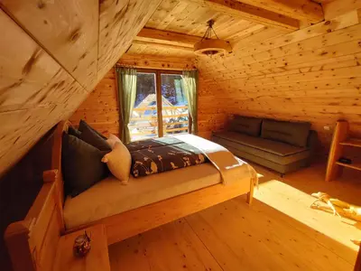 Ein Bett oder Betten in einem Zimmer der Unterkunft Kerschbaumer Chalet