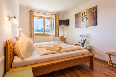 Ein Bett oder Betten in einem Zimmer der Unterkunft Apartments Harreiter