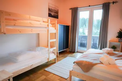 Ein Bett oder Betten in einem Zimmer der Unterkunft Edelweiß Gästehaus Lachtal