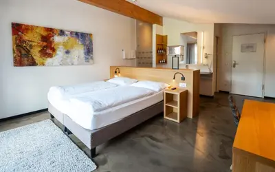 Ein Bett oder Betten in einem Zimmer der Unterkunft Hotel Matteo