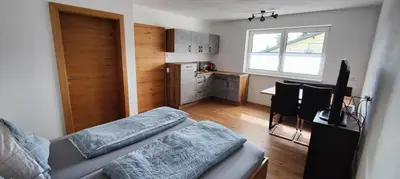 Ein Bett oder Betten in einem Zimmer der Unterkunft Haus Schartner Flachau