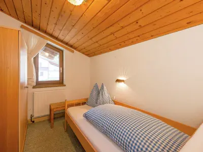 Ein Bett oder Betten in einem Zimmer der Unterkunft Holiday Home in Groebming near Ski Slopes