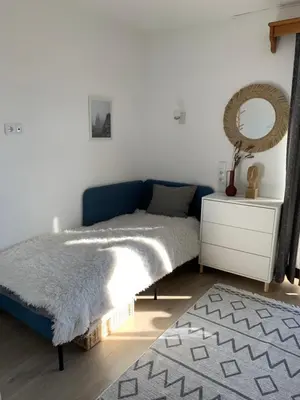 Ein Bett oder Betten in einem Zimmer der Unterkunft Nada Apartman