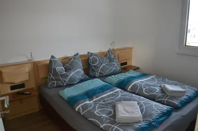 Ein Bett oder Betten in einem Zimmer der Unterkunft Apartment Ausblick