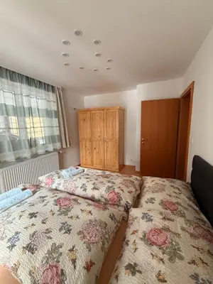 Ein Bett oder Betten in einem Zimmer der Unterkunft Wohnung in Hüttau
