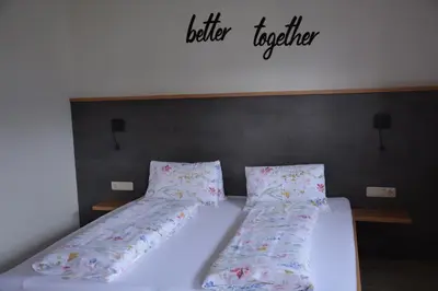 Ein Bett oder Betten in einem Zimmer der Unterkunft Appart Weisse Urlauben am Wolfgangsee