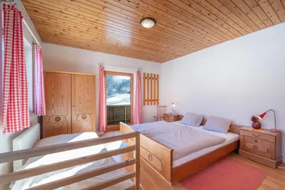 Ein Bett oder Betten in einem Zimmer der Unterkunft Appartementhaus Schmalzermoos