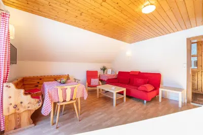 Ein Sitzbereich in der Unterkunft Appartementhaus Schmalzermoos