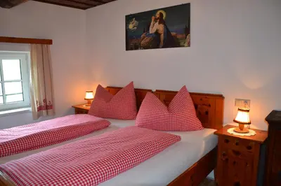 Ein Bett oder Betten in einem Zimmer der Unterkunft Ferienhaus Häuslbauer