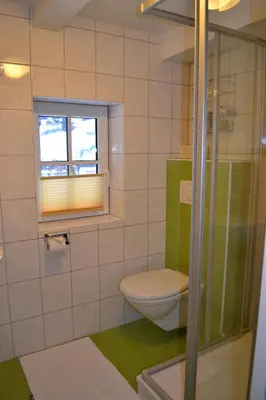 Ein Badezimmer in der Unterkunft Ferienhaus Häuslbauer