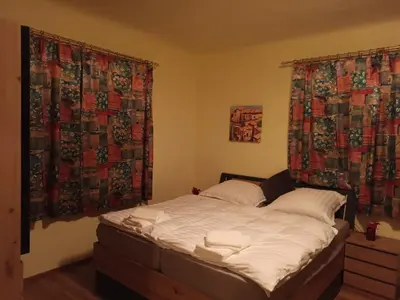 Ein Bett oder Betten in einem Zimmer der Unterkunft Zimmer Kropfmoar