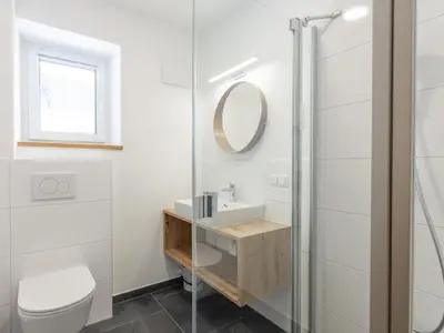 Ein Badezimmer in der Unterkunft Lärchenhof Top 203