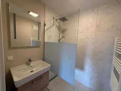 Ein Badezimmer in der Unterkunft Haus Schlatti
