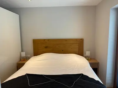Ein Bett oder Betten in einem Zimmer der Unterkunft Haus Schlatti