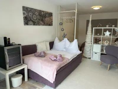 Ein Bett oder Betten in einem Zimmer der Unterkunft Sonnenblick