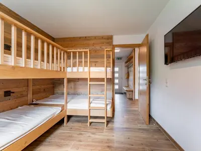 Ein Bett oder Betten in einem Zimmer der Unterkunft Wagrainer TauernLodge 42A